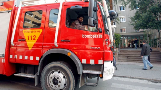 Un coche de bomberos en un suceso. Un coche de bomberos en un suceso.