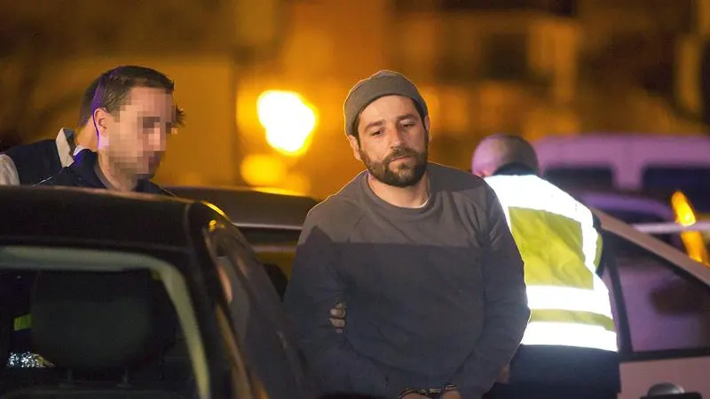 El detenido por empotrar su coche contra la sede del PP. El detenido por empotrar su coche contra la sede del PP.