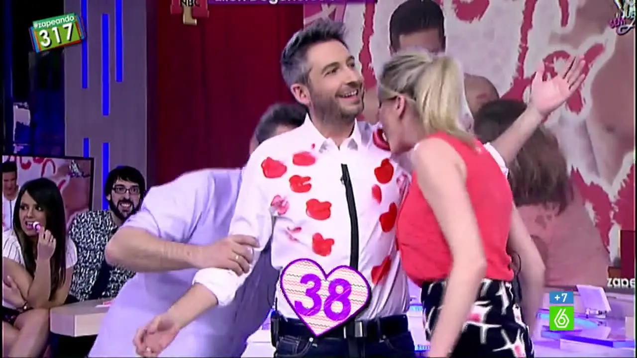 a besos a Frank Blanco