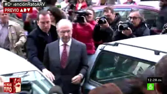 Rato llega a su despacho para su registro Rato llega a su despacho para su registro