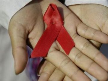 Lazo rojo que simboliza la lucha contra el sida Lazo rojo que simboliza la lucha contra el sida
