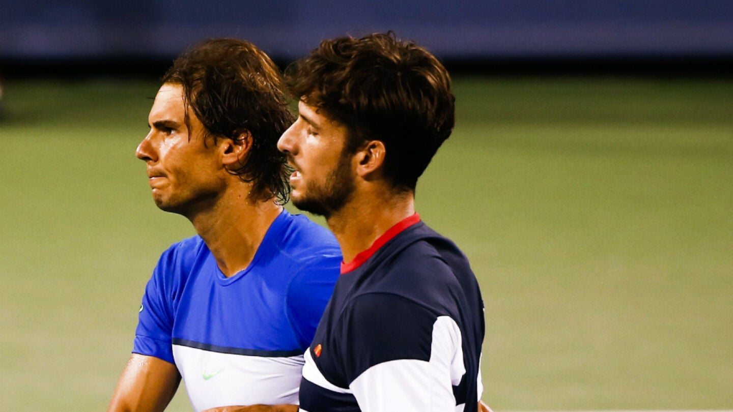 Rafa Nadal y Feliciano L&oacute;pez se saludan tras el partido