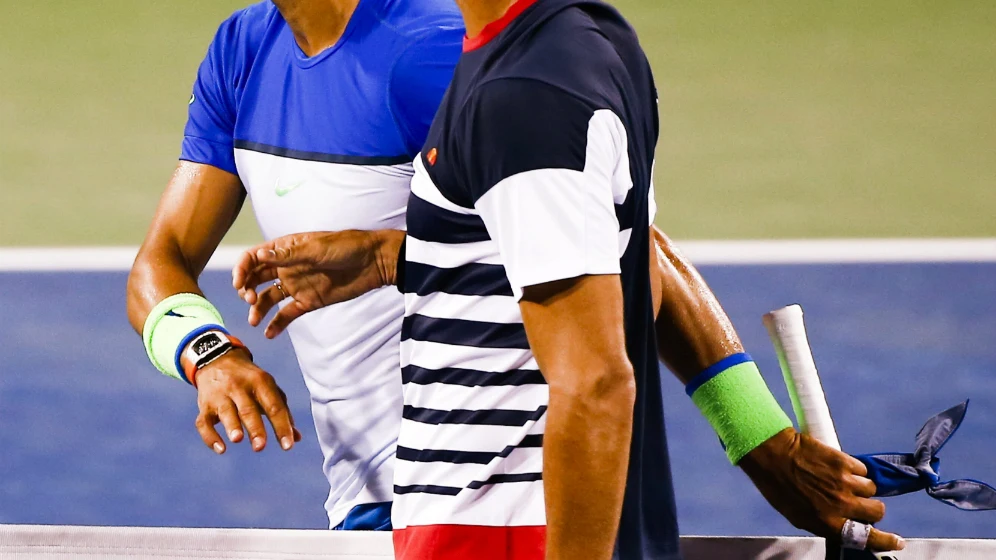 Rafa Nadal y Feliciano López se saludan tras el partido