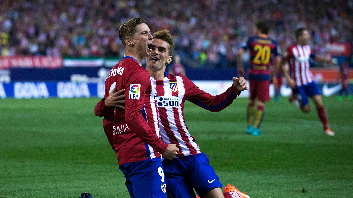 Fernando Torres y Griezmann celebrando un gol frente al F.C Barcelona Fernando Torres y Griezmann celebrando un gol frente al F.C Barcelona