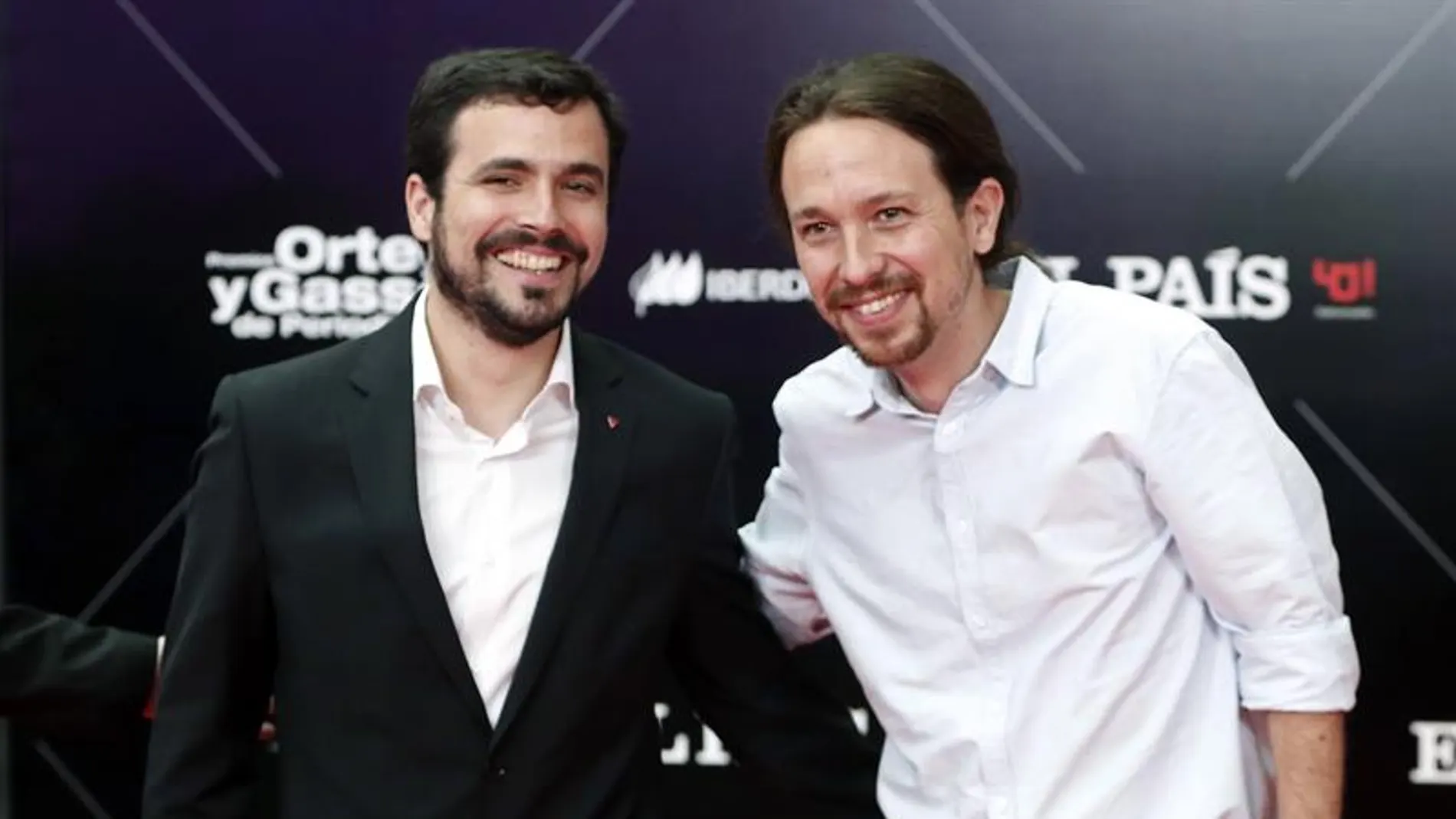 El líder de Podemos, Pablo Iglesias, y Alberto Garzón de IU