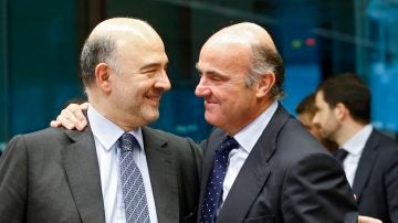 Pierre Moscovici y Luis de Guindos