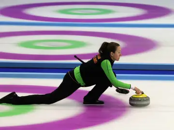 Jugadora de curling Jugadora de curling