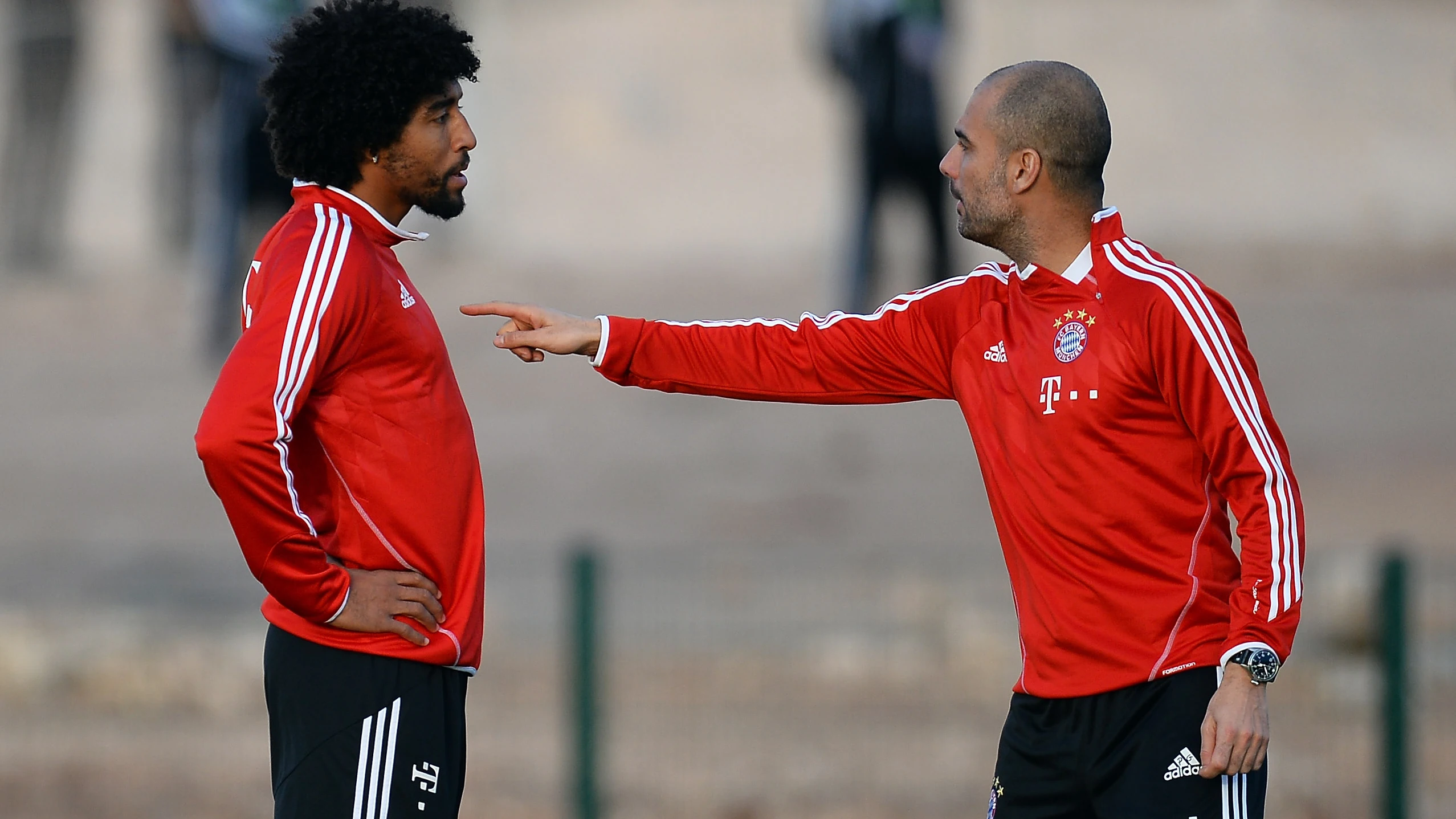 Dante y Guardiola discutiendo en su etapa en el Bayern.