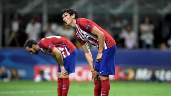 Savic junto a Juanfran en un partido del Atlético de Madrid Savic junto a Juanfran en un partido del Atlético de Madrid