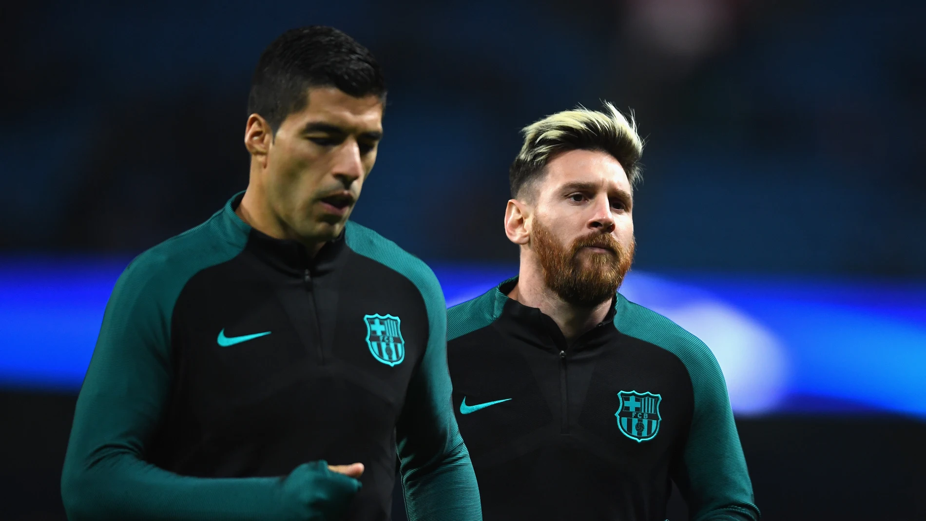 Luis Suárez y Leo Messi, en el calentamiento previo al choque ante el City
