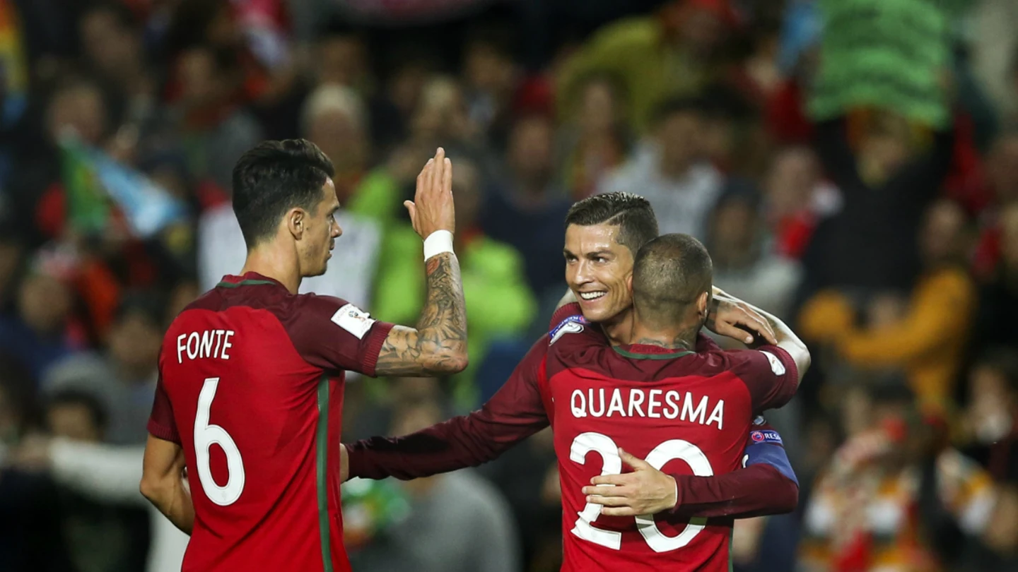 Cristiano celebra un gol con Fonte y Quaresma Cristiano celebra un gol con Fonte y Quaresma