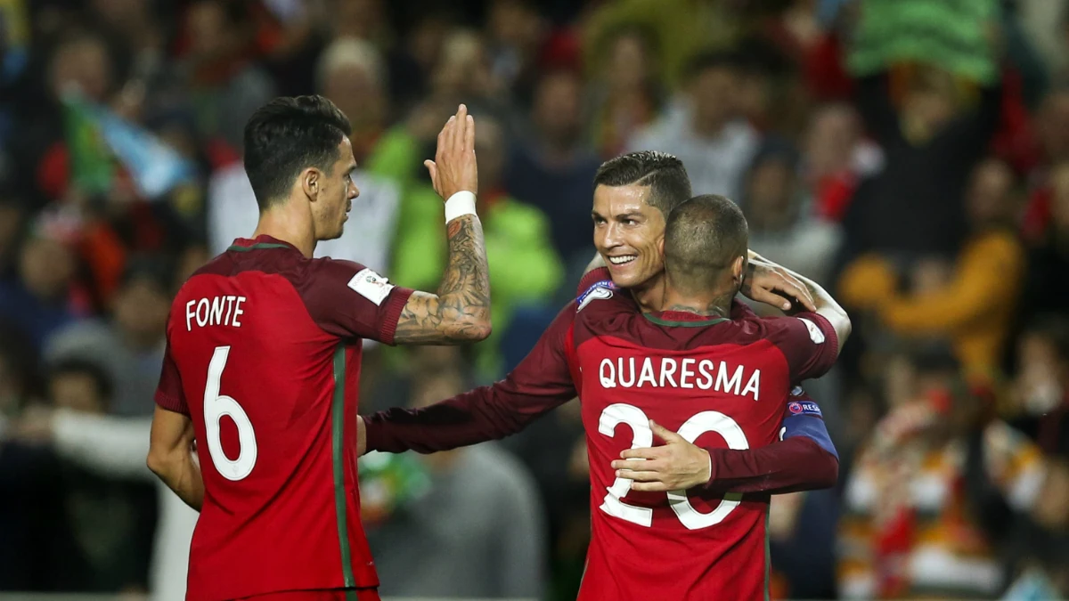 Cristiano celebra un gol con Fonte y Quaresma Cristiano celebra un gol con Fonte y Quaresma