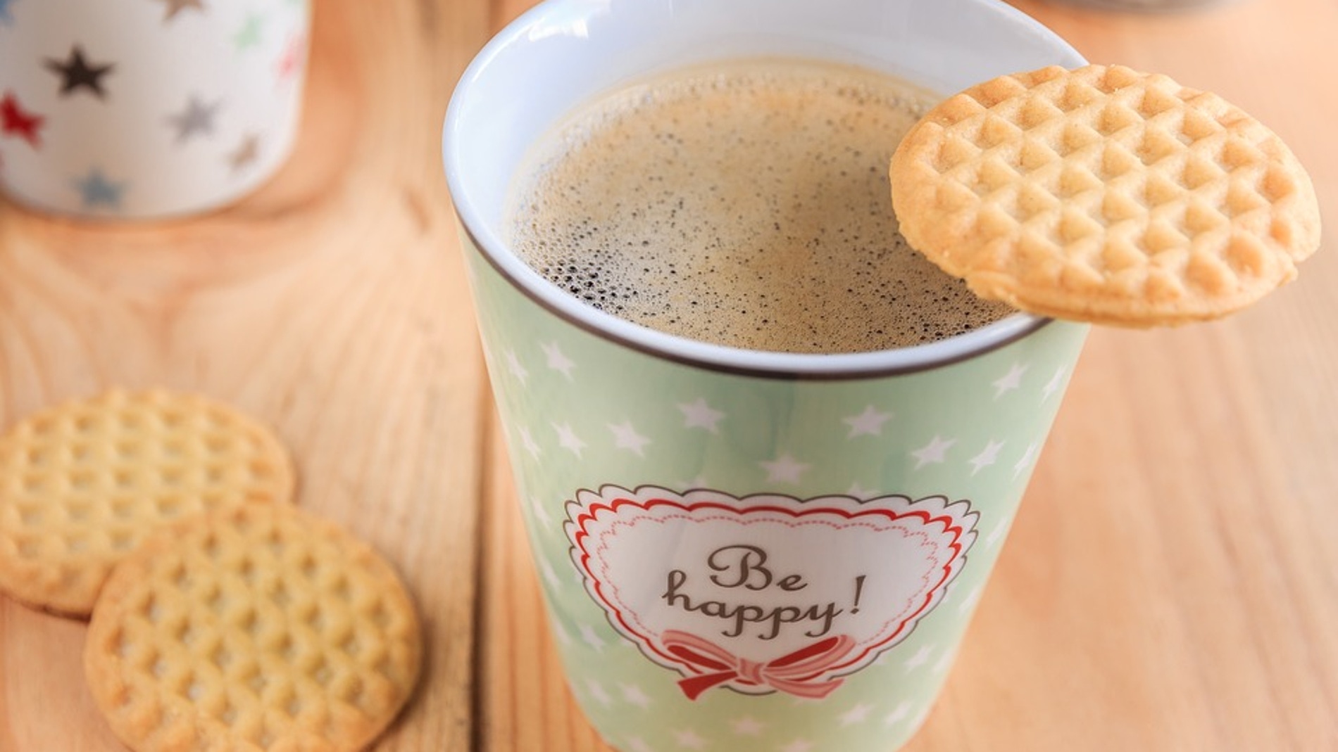 Café con leche y una galleta
