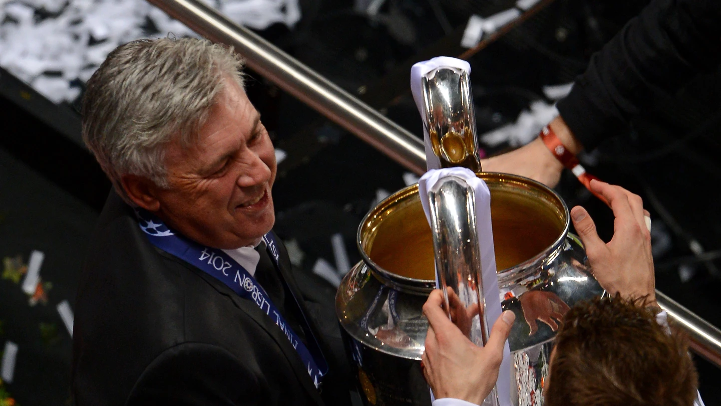 Ancelotti junto a Ramos tras ganar la 'Decima' en Lisboa Ancelotti junto a Ramos tras ganar la 'Decima' en Lisboa