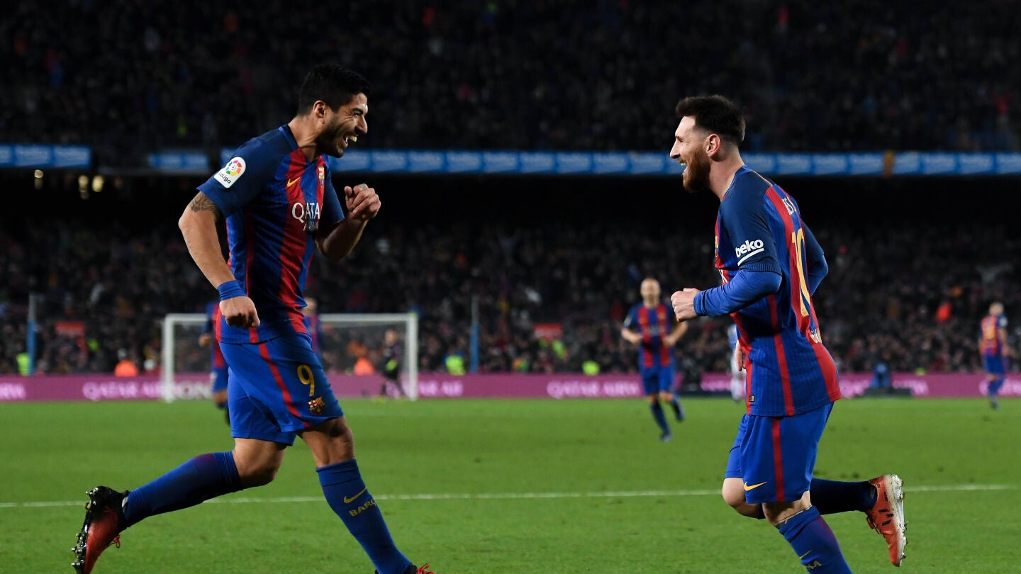 Messi y Luis Su&aacute;rez celebran un gol ante el Espanyol