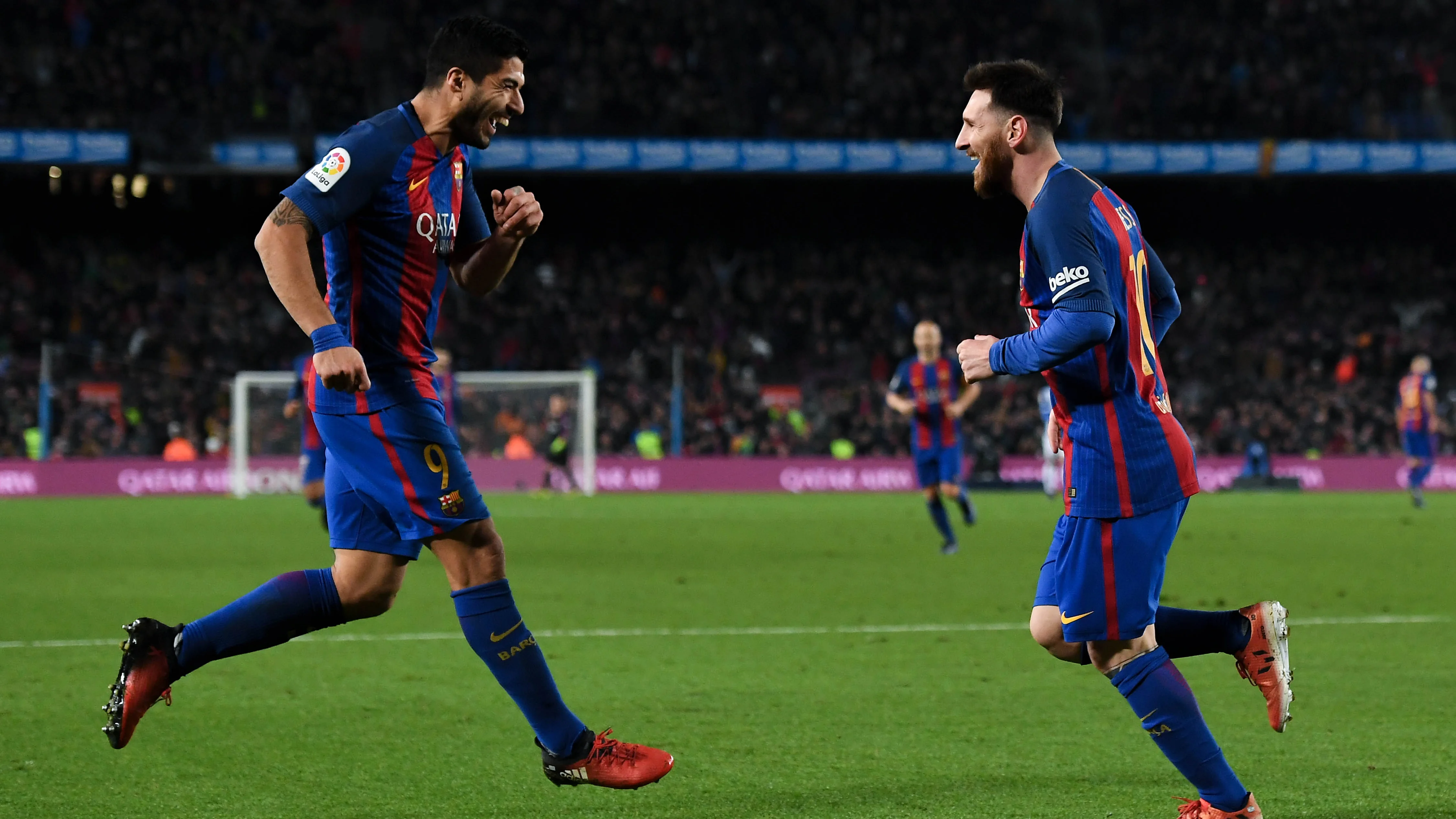 Messi y Luis Suárez celebran un gol ante el Espanyol