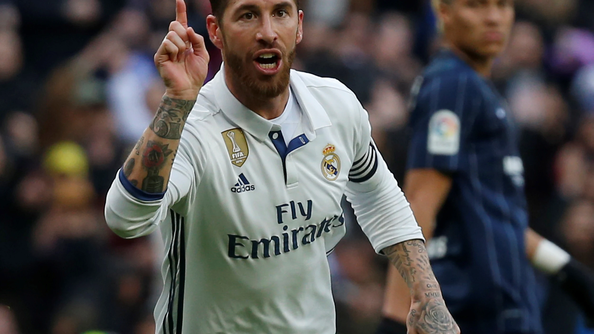 Sergio Ramos celebra uno de sus goles durante el Real Madrid - Málaga