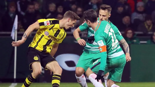 Erik Durm frente a Bauer y Bartels Erik Durm frente a Bauer y Bartels