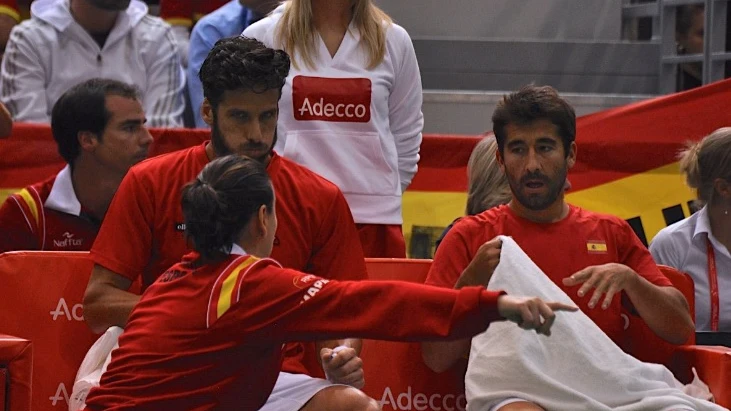 Marc López y Feliciano López reciben instrucciones de Conchita Martínez