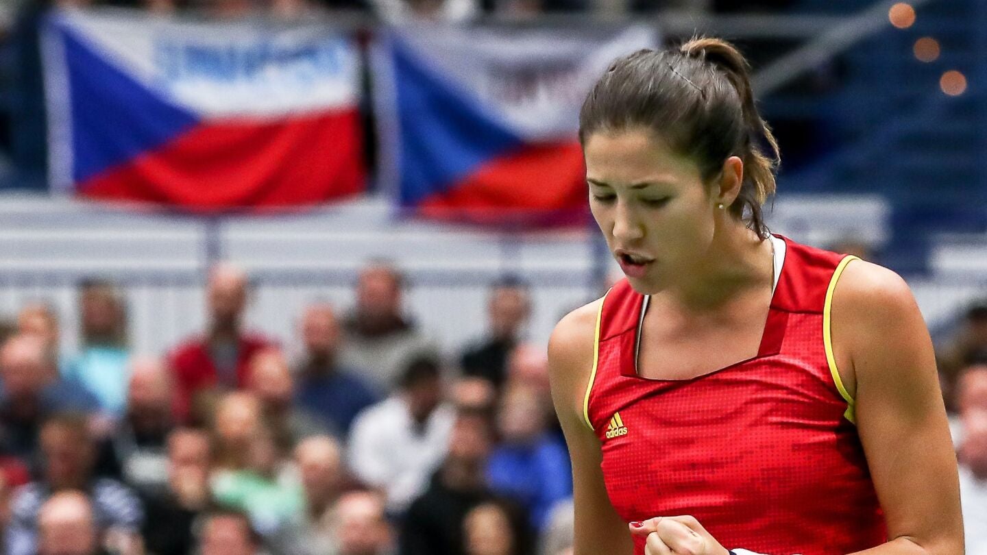 Garbi&ntilde;e Muguruza celebra un punto durante el partido