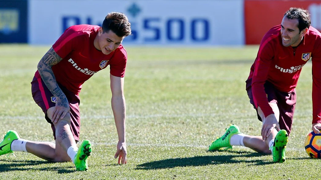 Diego Godín, con Giménez