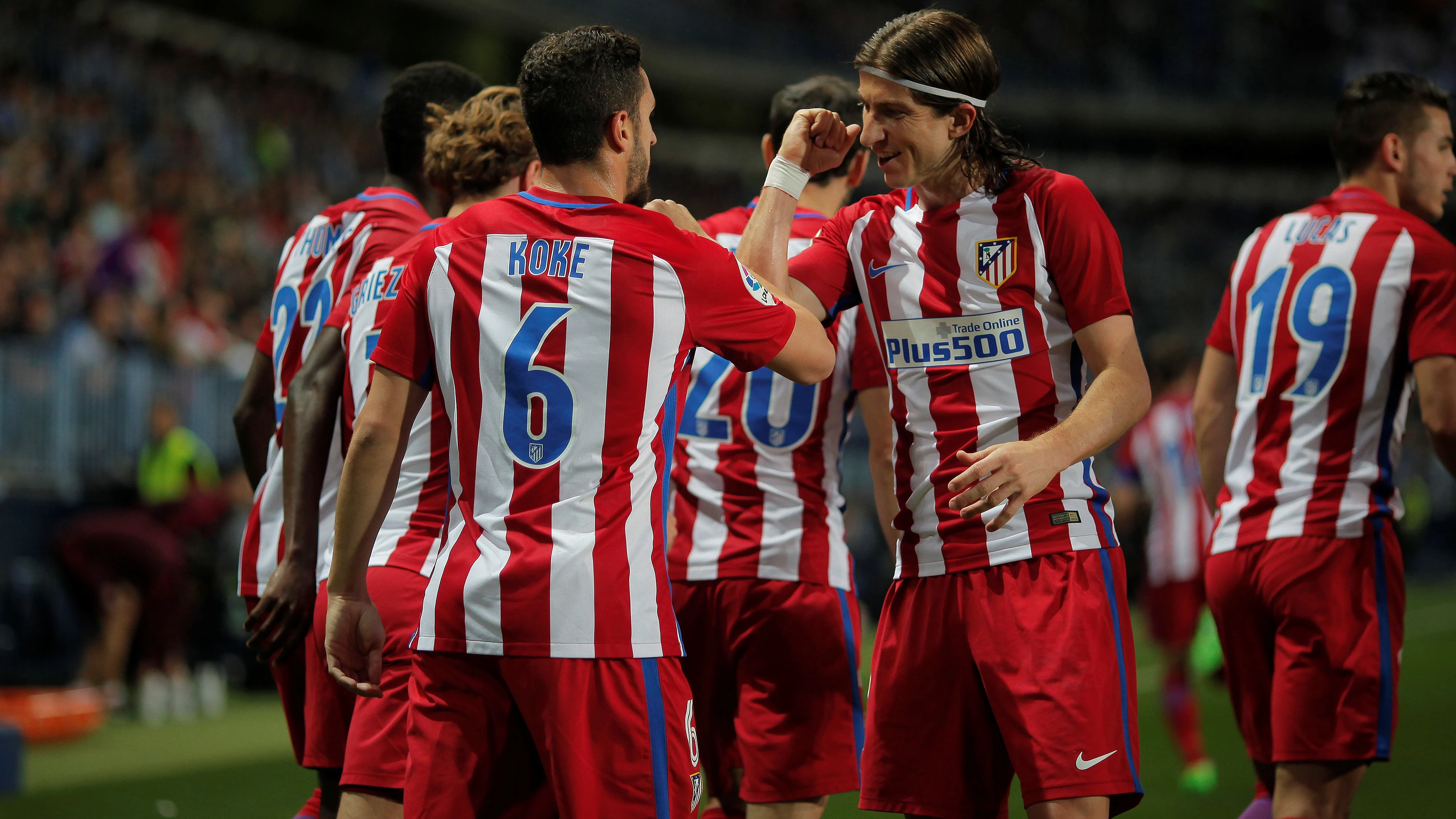 Los jugadores del Atlético de Madrid celebran el gol de Koke contra el Málaga