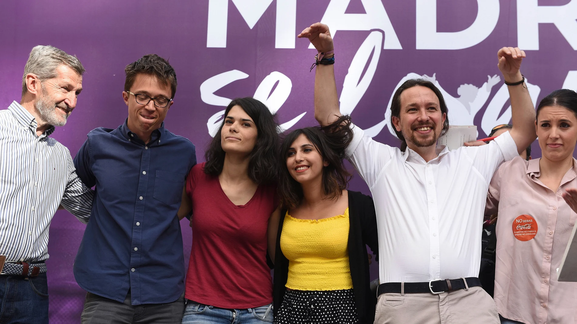 Miembros de Podemos, en el acto 'Madrid se levanta'