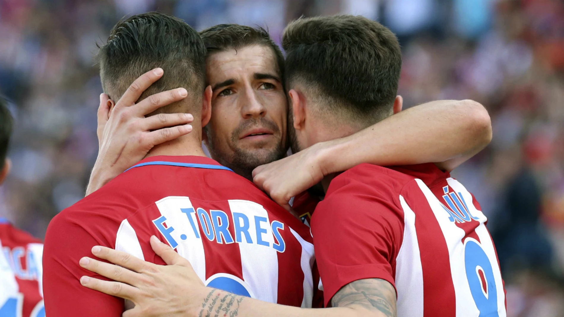 Torres, Gabi y Saúl celebran un gol del Atlético