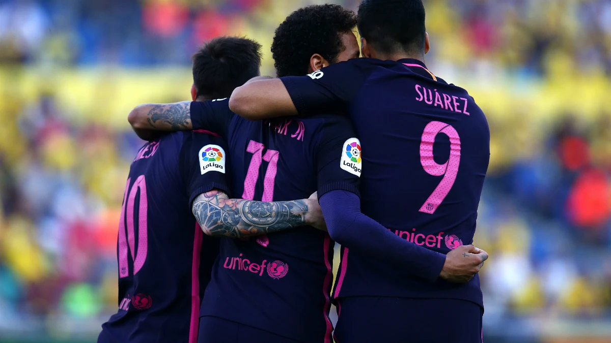 Messi, Suárez y Neymar celebran un gol