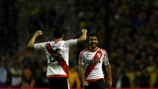 Leonardo Ponzio y Ignacio Fernandez celebran el triunfo ante Boca Juniors Leonardo Ponzio y Ignacio Fernandez celebran el triunfo ante Boca Juniors