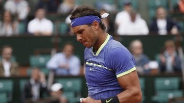 Nadal celebra un punto ante Carreño