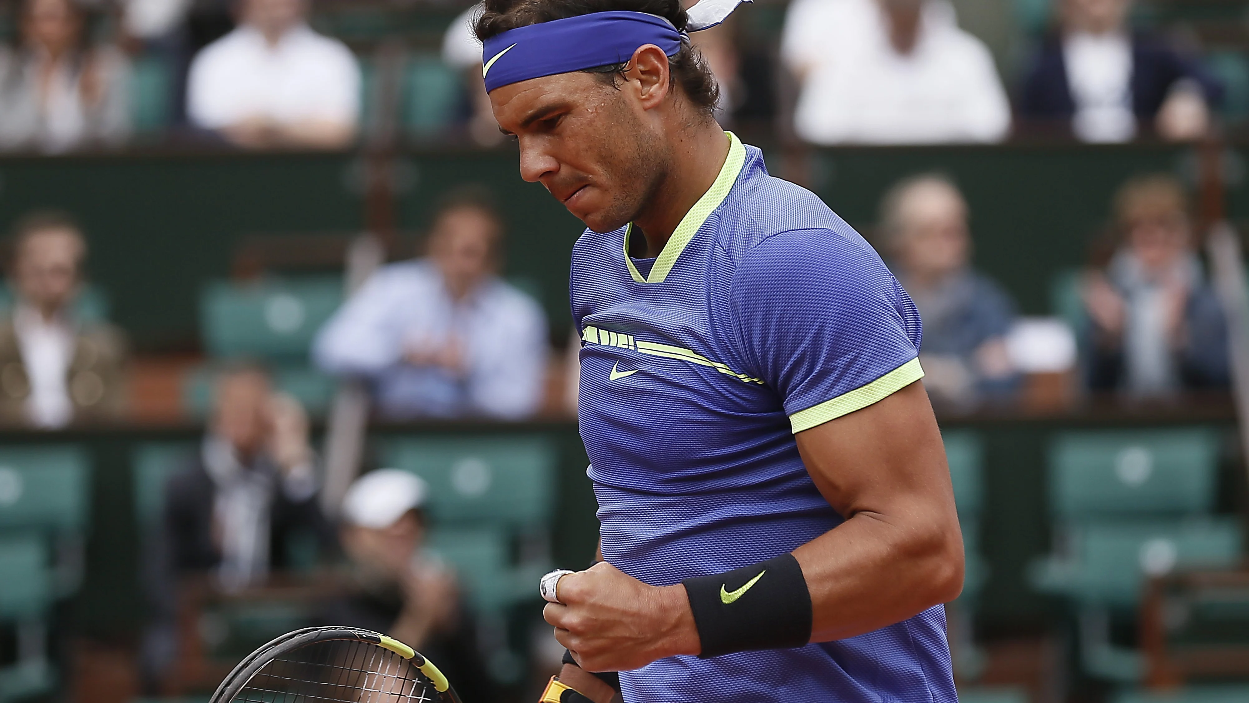 Nadal celebra un punto ante Carreño