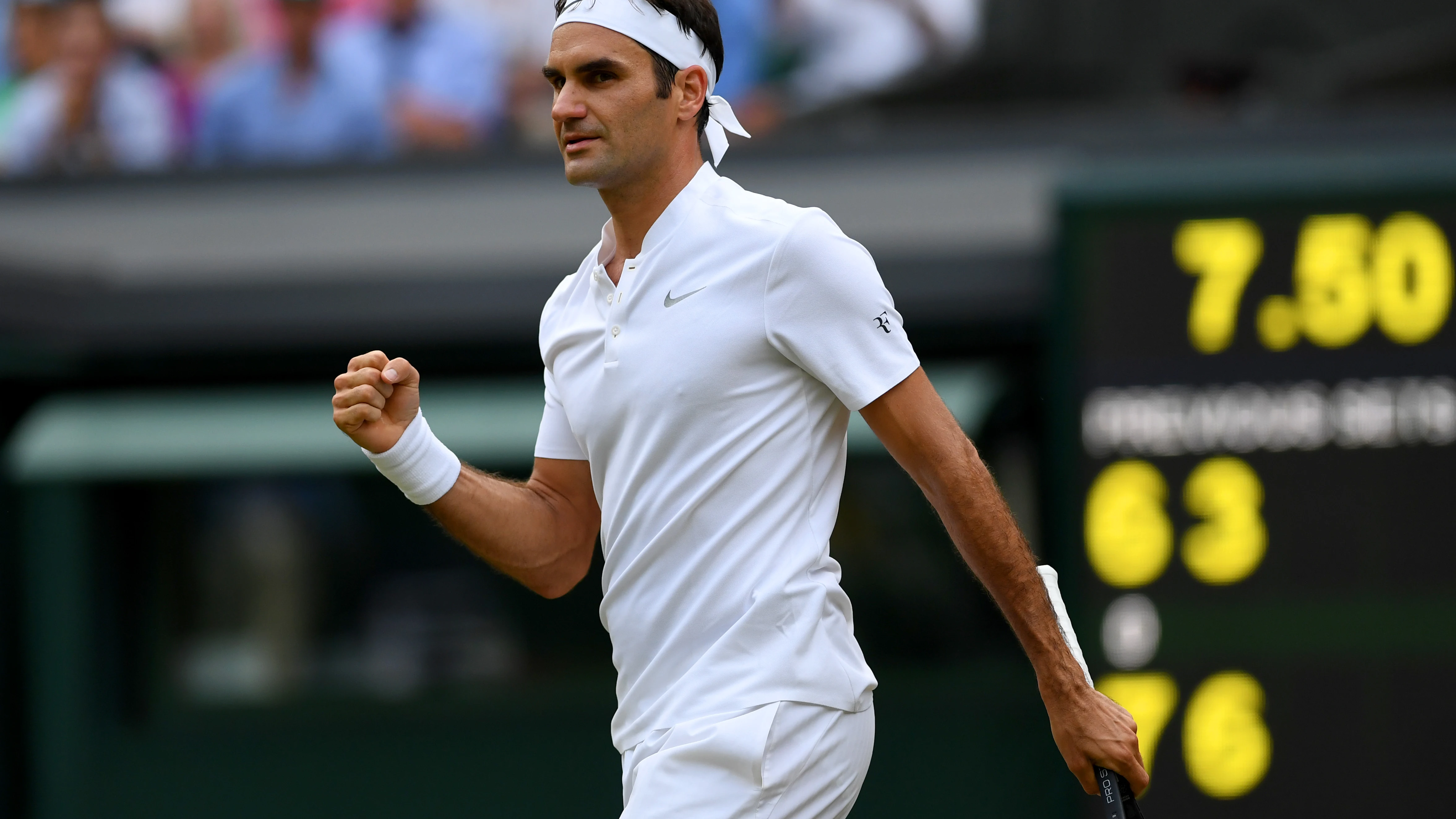 Roger Federer celebra un punto ante Lajovic Roger Federer celebra un punto ante Lajovic