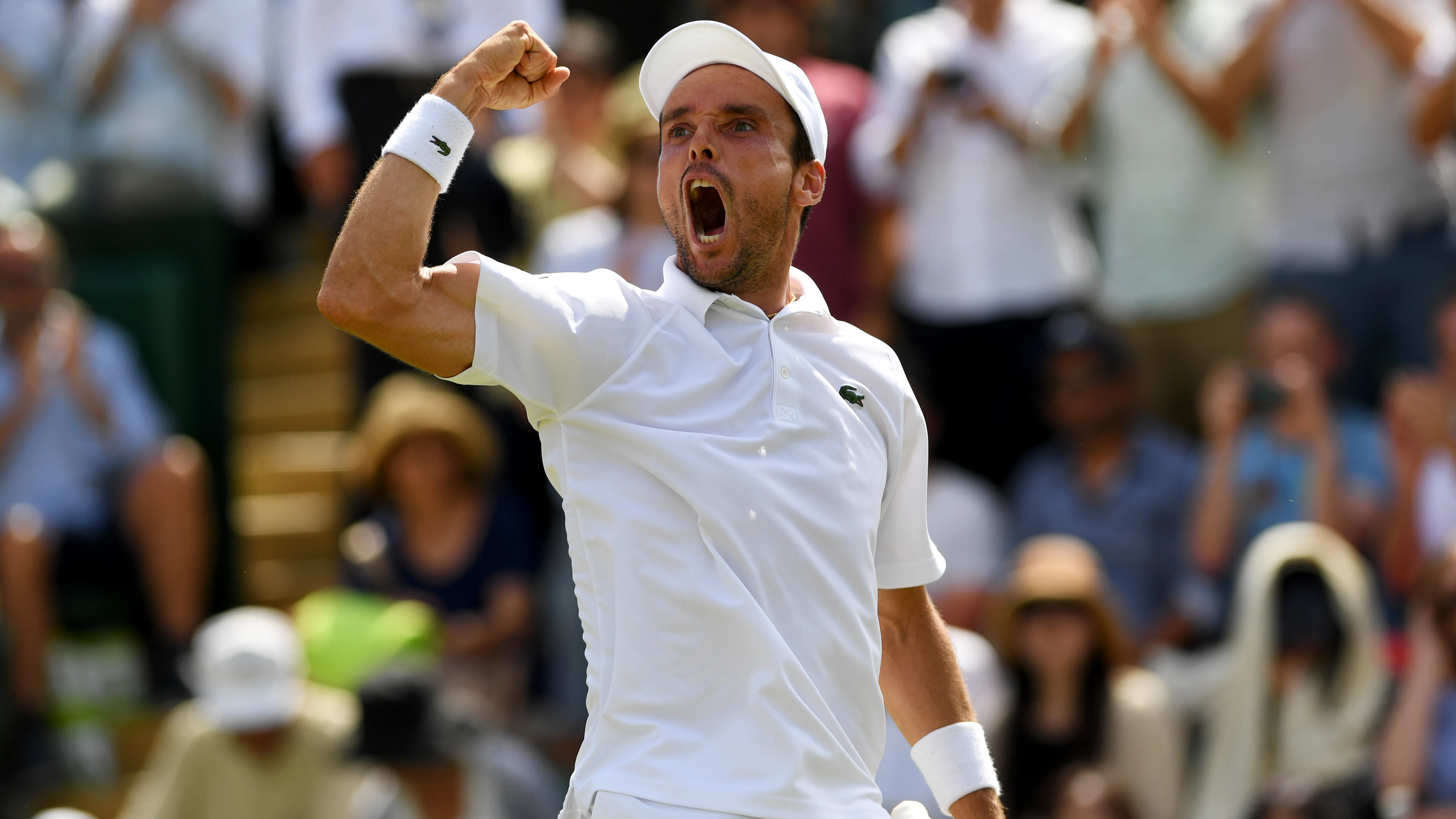 Bautista celebra el triunfo ante Nishikori