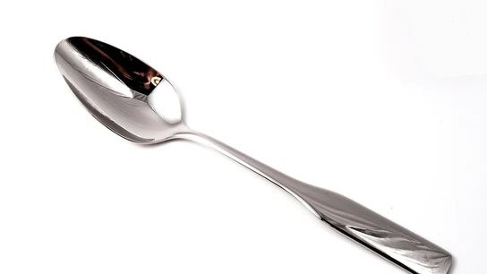 Cuchara metálica, imagen de archivo Cuchara metálica, imagen de archivo