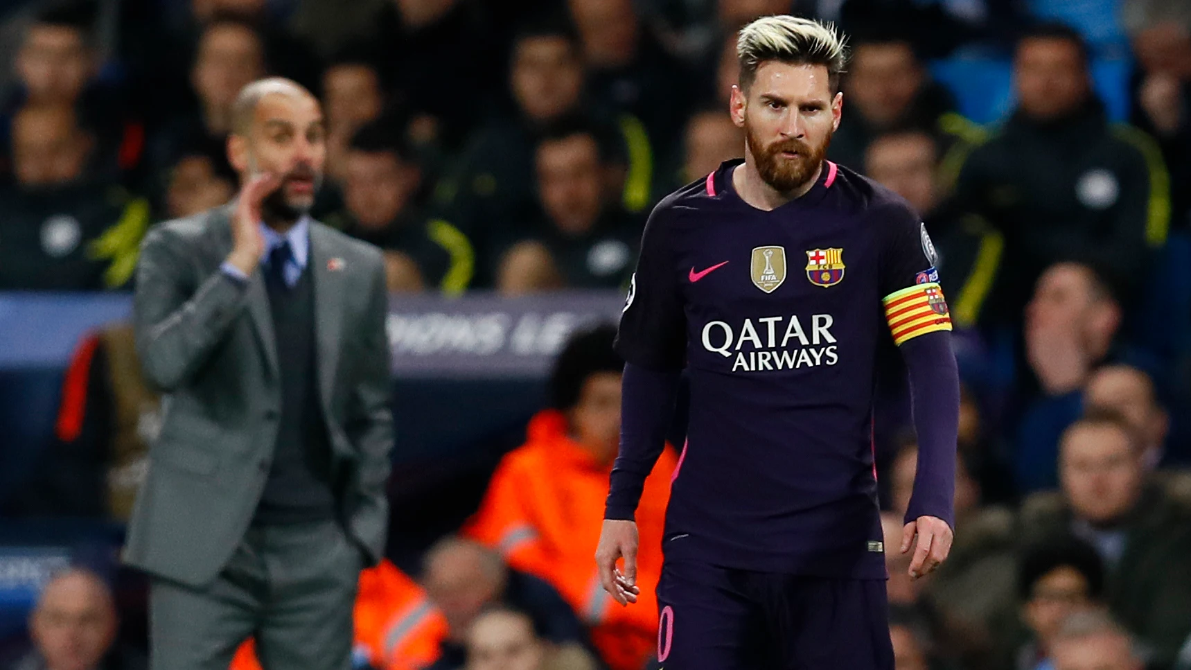 Leo Messi, con Guardiola en segundo plano