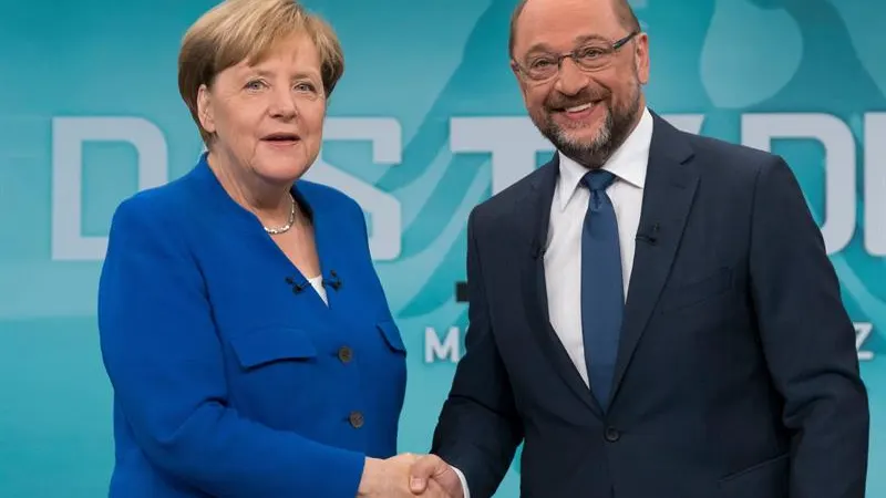 Merkel y Schulz, antes de empezar el debate