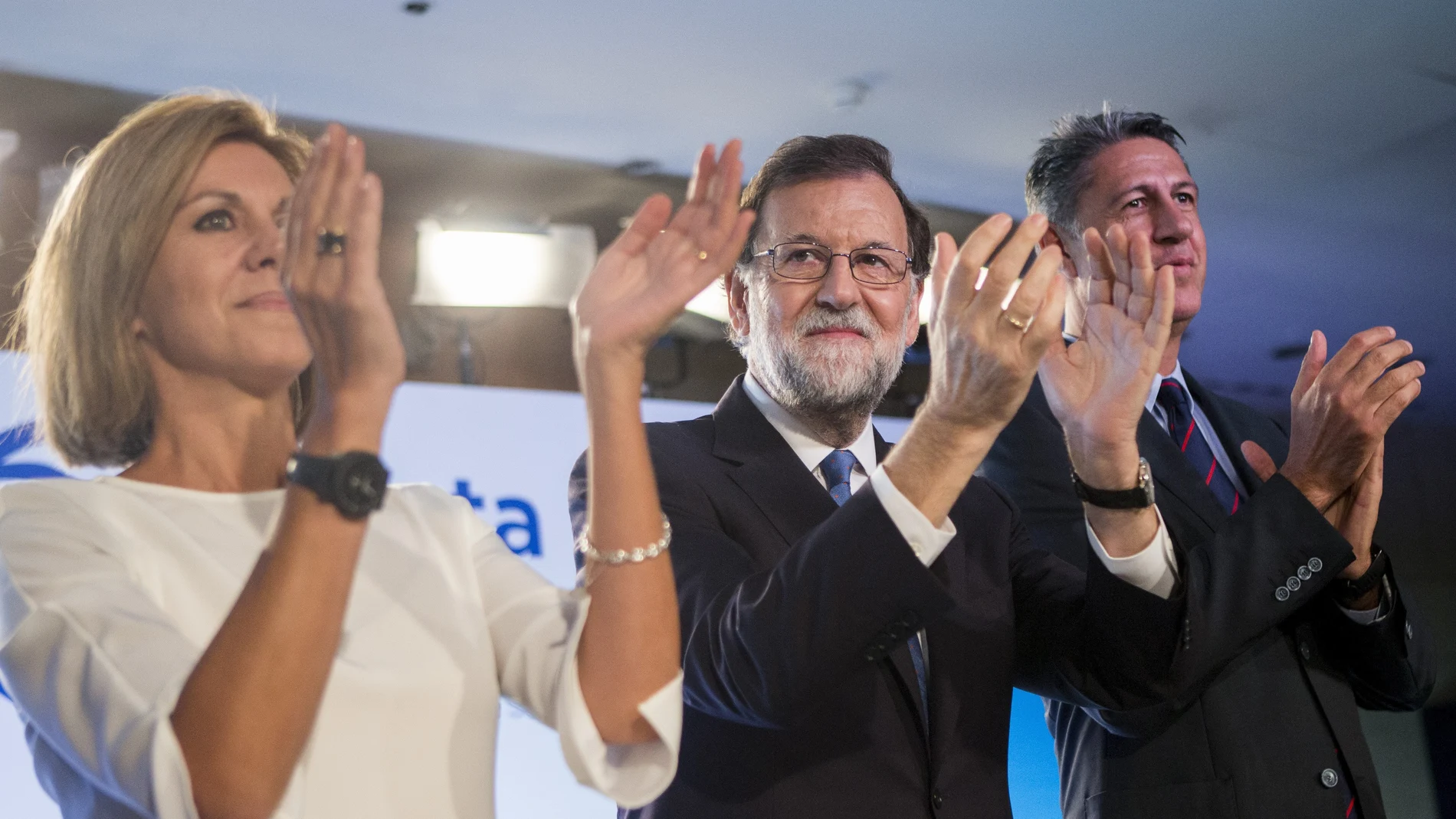 Mariano Rajoy, junto a la secretaria general del PP, María Dolores de Cospedal, y el presidente de los populares catalanes, Xavier García Albiol