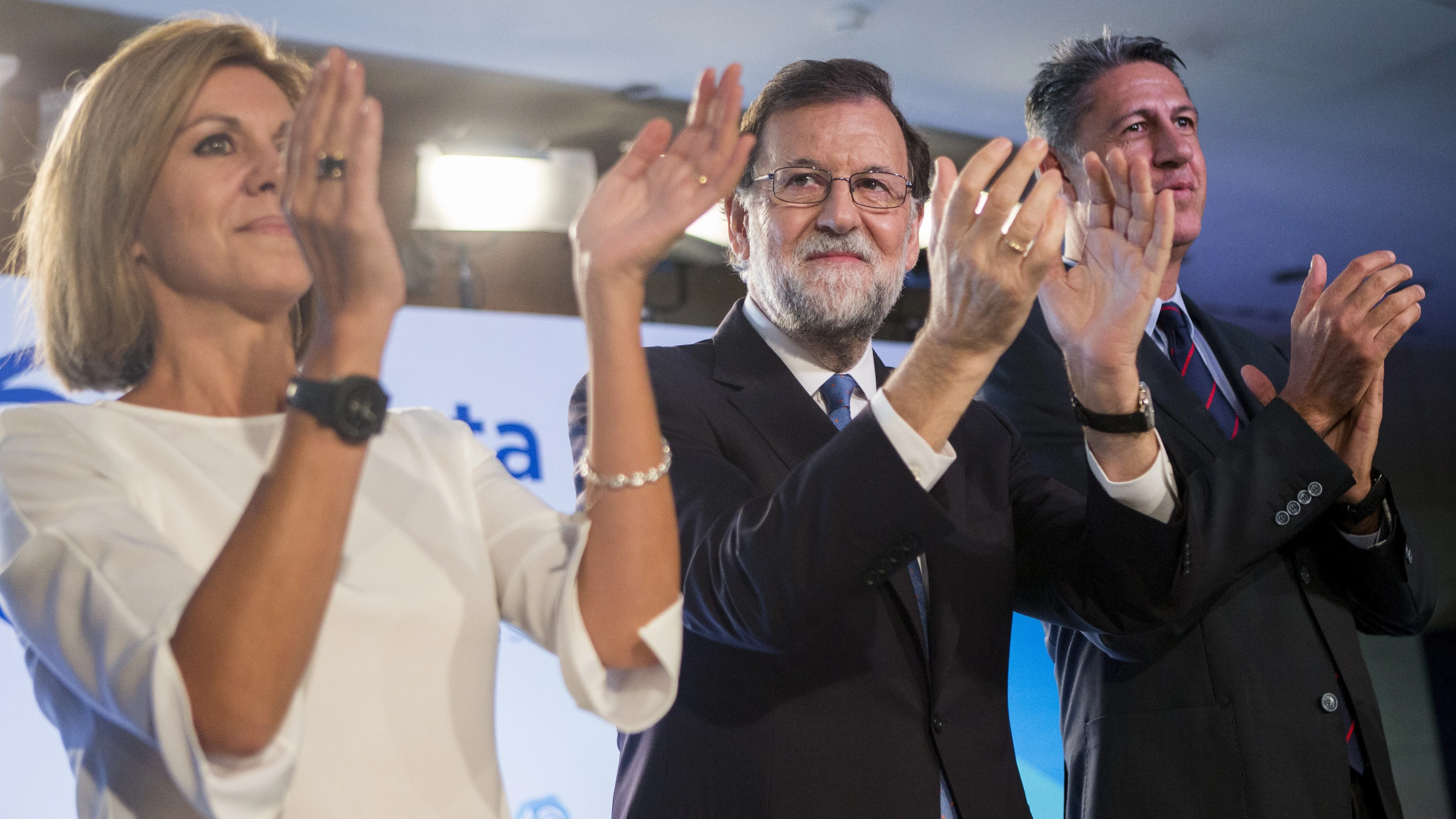 Mariano Rajoy, junto a la secretaria general del PP, María Dolores de Cospedal, y el presidente de los populares catalanes, Xavier García Albiol