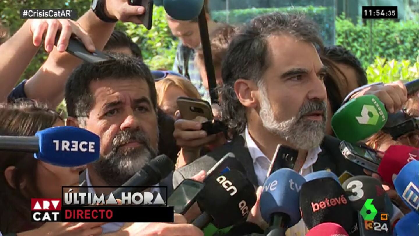 Jordi Cuixart y Jordi S&aacute;nchez a la salida de la Audiencia Nacional