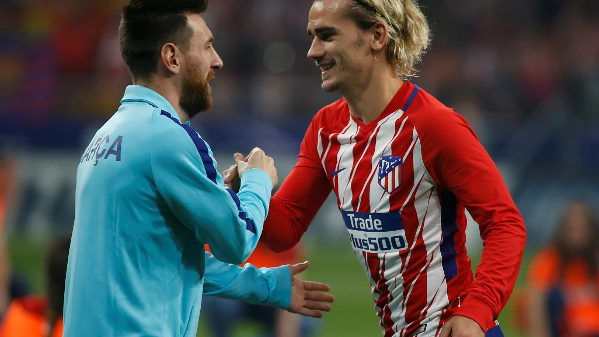 Griezmann y Messi se saludan