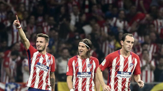 Sa&uacute;l celebra con Filipe Luis y God&iacute;n un gol del Atl&eacute;tico
