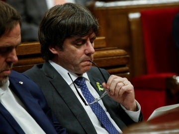 Carles Puigdemont y Oriol Junqueras en el Parlament Carles Puigdemont y Oriol Junqueras en el Parlament