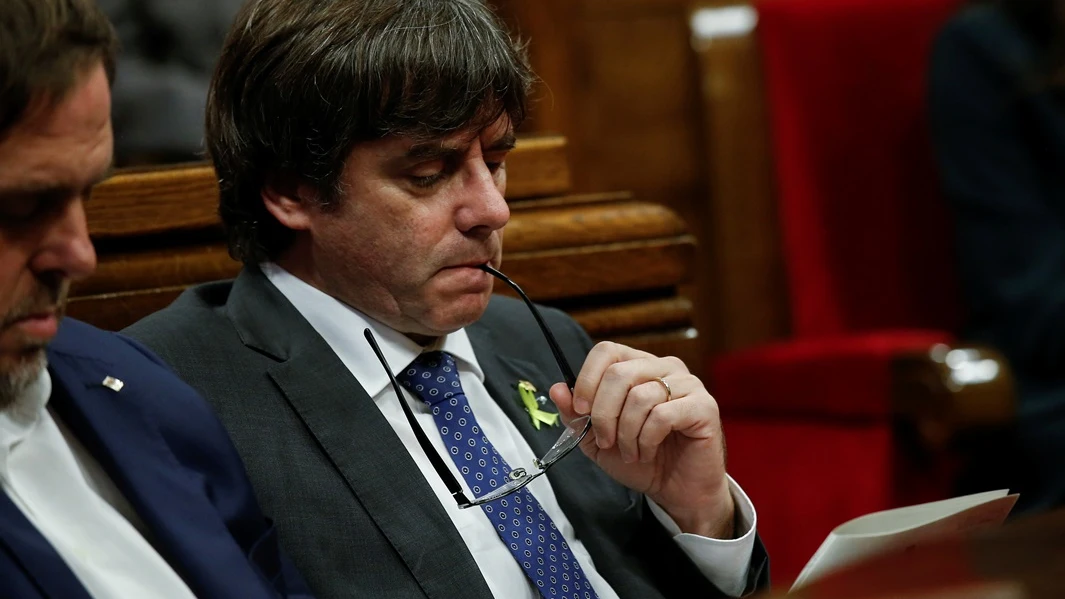 Carles Puigdemont y Oriol Junqueras en el Parlament