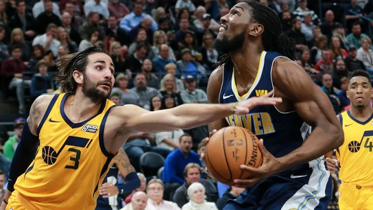 Ricky Rubio intenta tapar el intento de canasta de Kenneth Faried Ricky Rubio intenta tapar el intento de canasta de Kenneth Faried