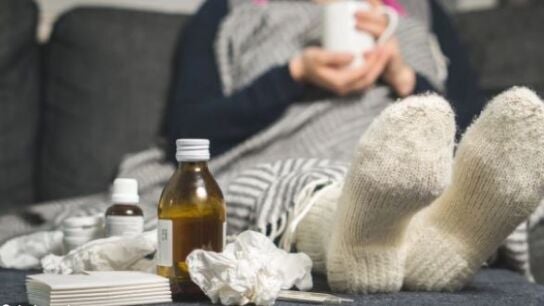 Una persona con proceso gripal