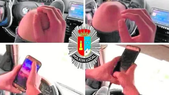 Un hombre conduce con los pies al volante Un hombre conduce con los pies al volante