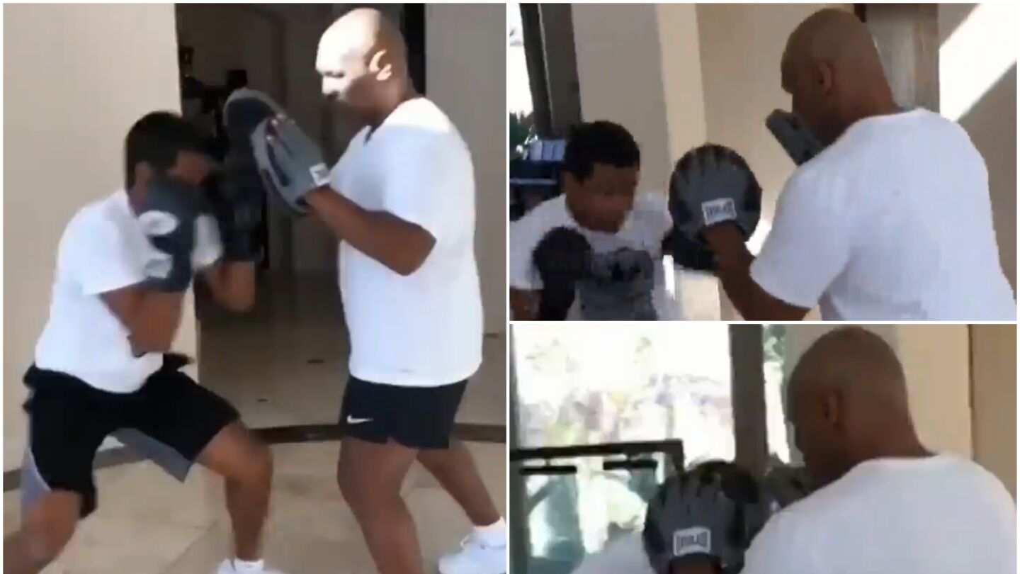 Tyson ense&ntilde;a a boxear a su hijo