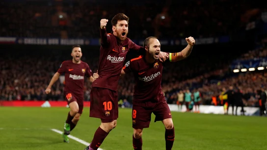 Iniesta y Messi celebran el gol de Leo Iniesta y Messi celebran el gol de Leo