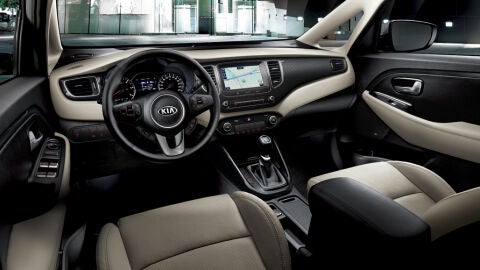 kia_carens_my17_dashboard_-_side_view_beige_interior